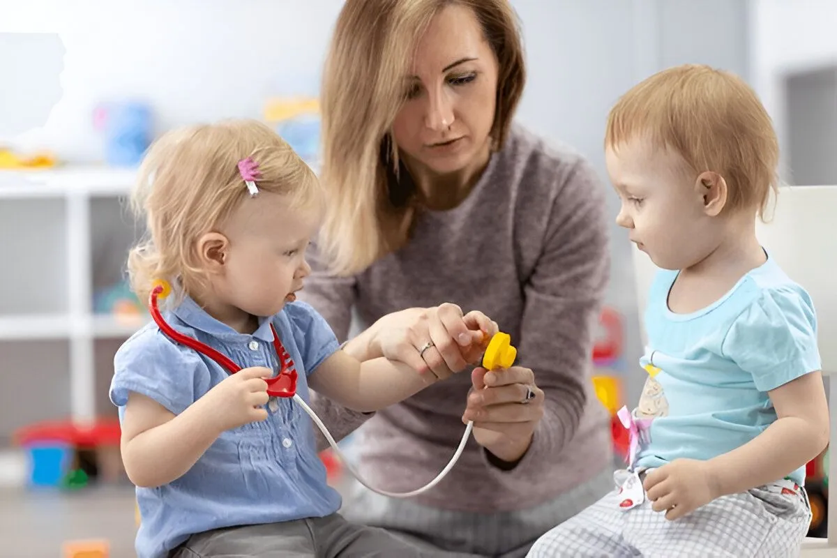 The Role of Adults in Supporting Emotional Development Through Role-Play Adult engaging in role-play with a young child to support emotional development